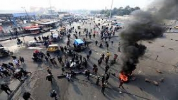 إصابة 7 في اشتباكات ببغداد والسلطات تزيل الحواجز وتفتح الطرق
